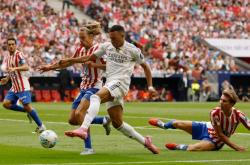 半岛体育登录入口-马竞淡定迎战！齐达内回归皇马，西甲豪门战火重燃